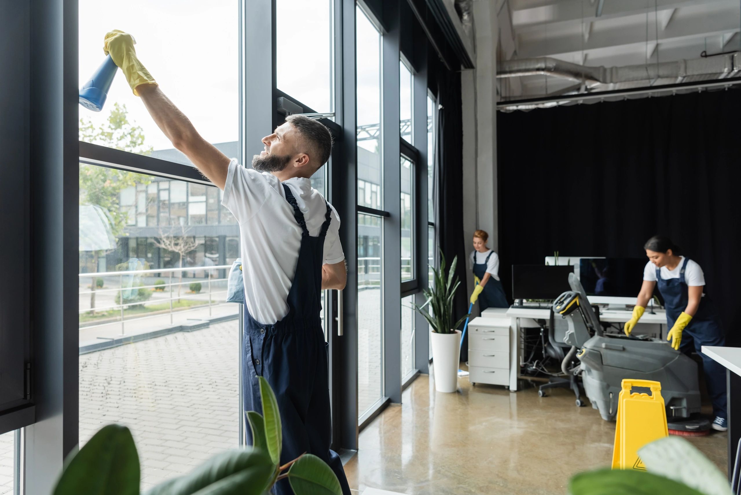 Professional cleaning team working in a modern office